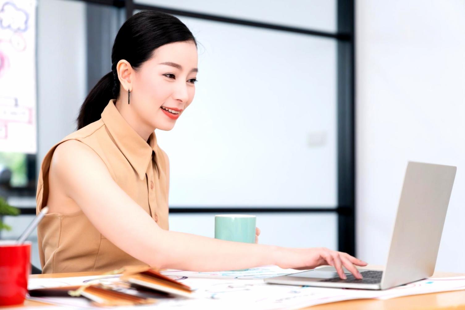 Person reviewing financial documents and investment statements